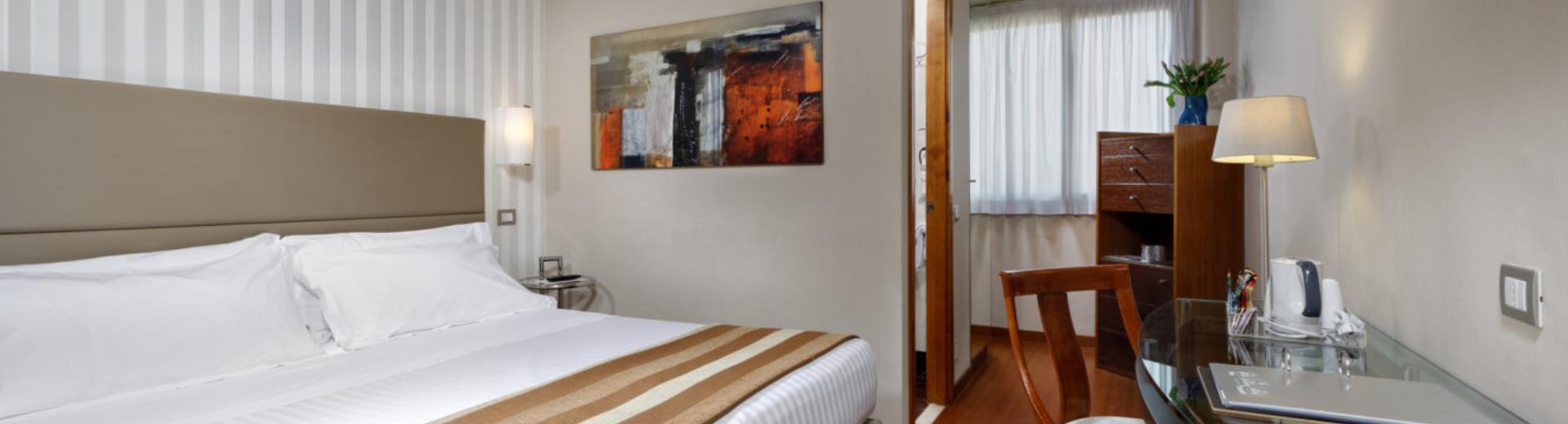 Geniet van de ontspanning in de klassieke kamers van het Hotel Piccadilly!